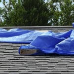 Tarp Covering Residential Roof Leak