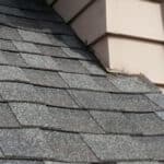 Old roof with curling shingles